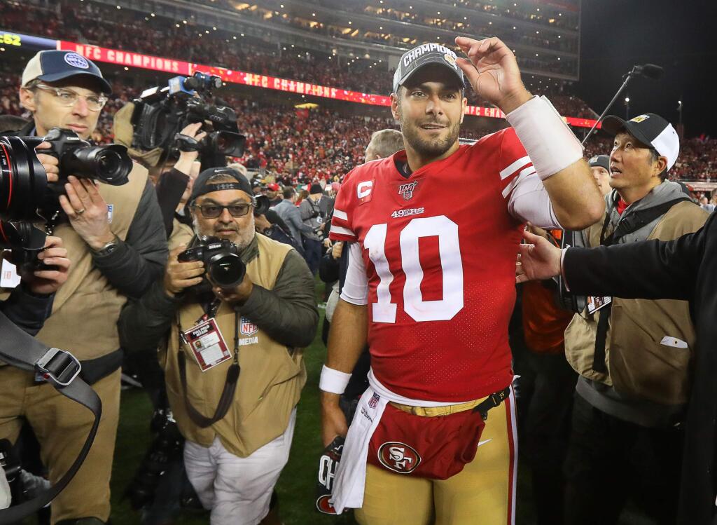 San Francisco 49ers quarterback Jimmy Garoppolo celebrates his team’s win over the Green Bay Packers in the NFC championship game at Levi's Stadium in Santa Clara on Sunday, Jan. 19, 2020. The 49ers defeated the Packers 37-20. (Christopher Chung / The Press Democrat)