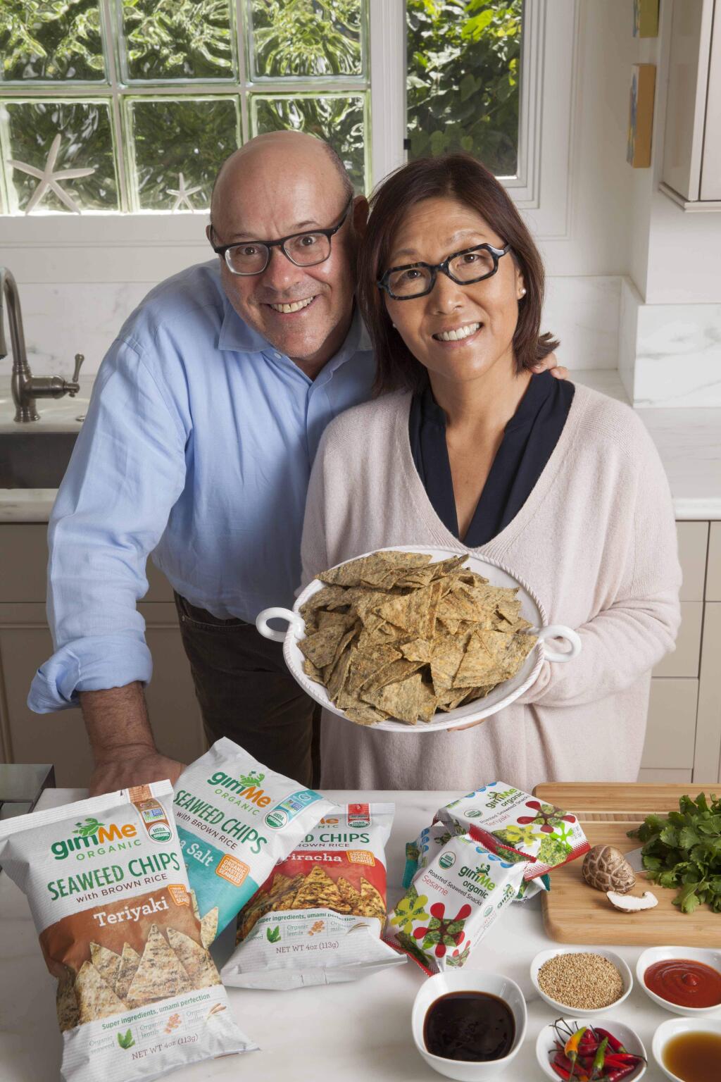 Steve Broad with Annie Chun and their company's gimMe Organic seaweed chips. (LORI EANES FOR GIMME HEALTH FOODS)