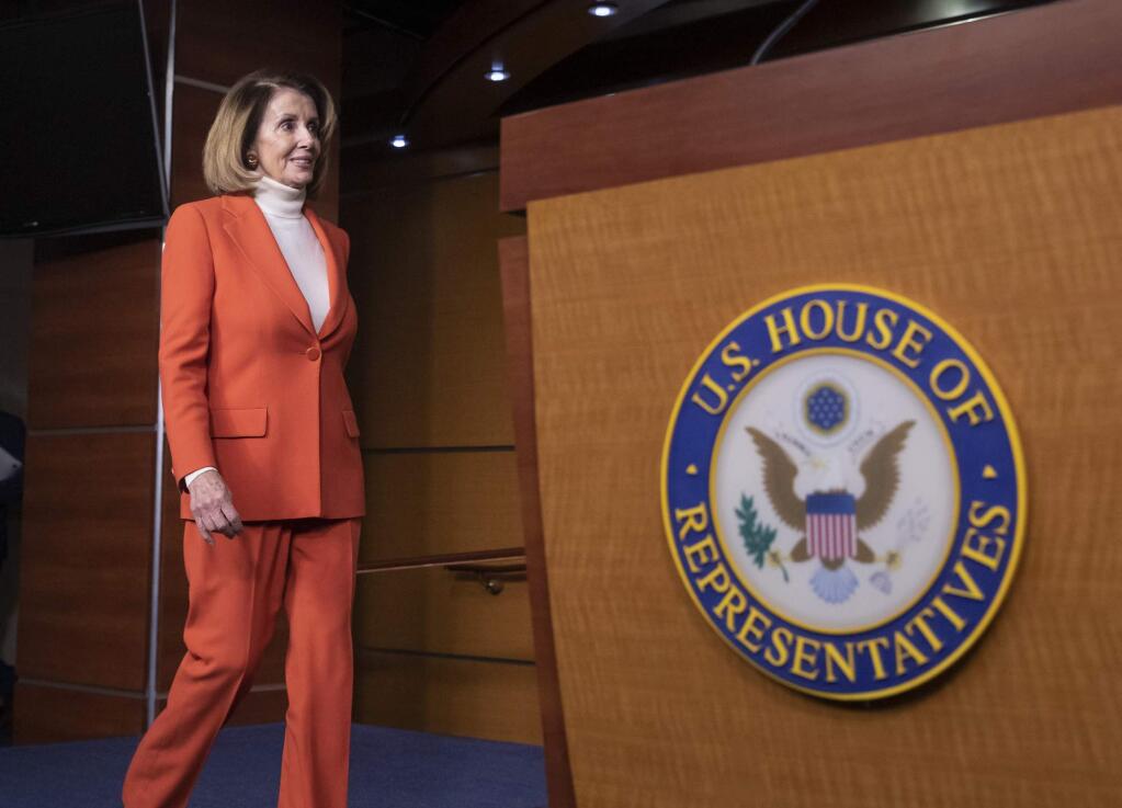 House Minority Leader Nancy Pelosi, D-Calif., arrives to face reporters at a news conference at the Capitol in Washington, Thursday, Nov. 15, 2018. (AP Photo/J. Scott Applewhite)