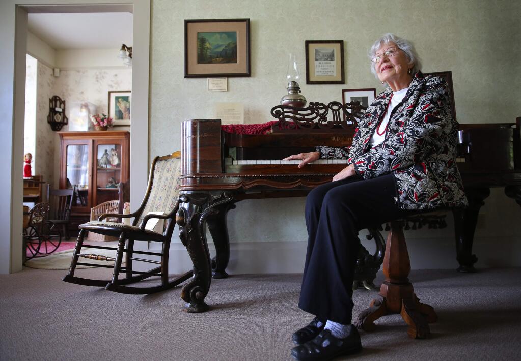 Louise Morris, 95, is a docent at the Cloverdale History Center and Museum. Morris helped lead the preservation of the 1862 Gould-Shaw House in the 1980's. The house is the oldest documented dwelling in Cloverdale.(Christopher Chung/ The Press Democrat)