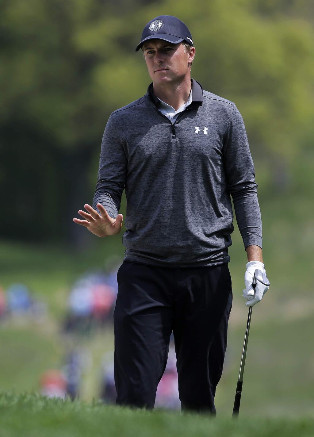 Jordan Spieth reacts after hitting out of a bunker on the third green during the second round of the PGA Championship golf tournament, Friday, May 17, 2019, at Bethpage Black in Farmingdale, N.Y. (AP Photo/Seth Wenig)