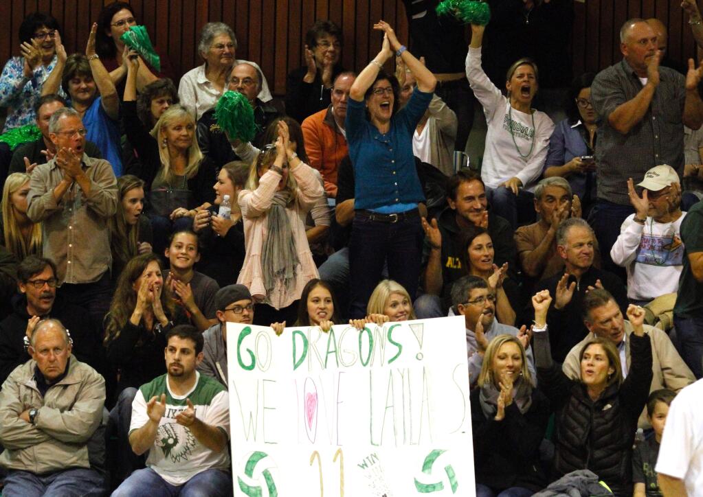 Bill Hoban/Index-TribuneThe dream season continuesFans cheer as the Sonoma Valley High Lady Dragon volleyball team take the second set in Tuesday night's NorCal quarterfinal game against Christian Brothers High from Sacramento. The Lady Dragons went on to win the match 3-1 in front of a packed Peiffer Gym. Sonoma's next game is at Valley Christian in San Jose Saturday. For the game story, see A5.