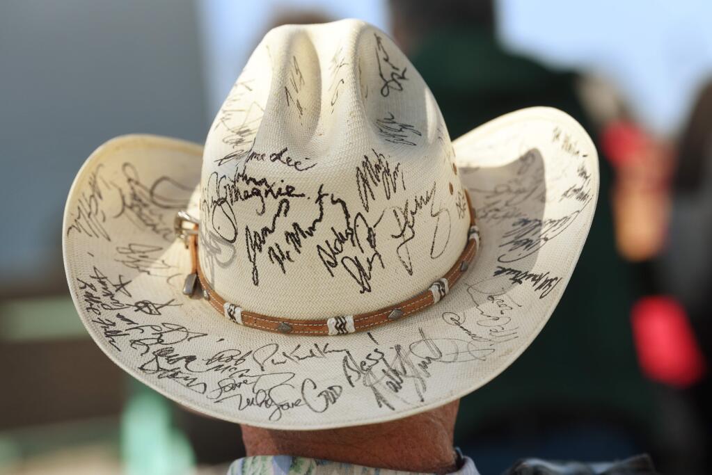 Jeff Bechler, of Petaluma, wearing a cowboy hat covered with autographs from bluegrass musicians, during RockSoberFest, an alcohol-free music festival, held Saturday at Sonoma-Marin Fairgrounds in Petaluma, California. September 28, 2019.(Photo: Erik Castro/for The Press Democrat)
