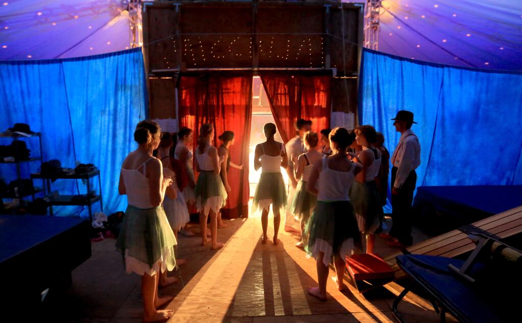 Performers of Circus Waldissima, students of Summerfield Waldorf School & Farm, prepare to enter stage center as they entertain family and friends under the bigtop, Friday March 20, 2015 in Santa Rosa. (Kent Porter / Press Democrat) 2015