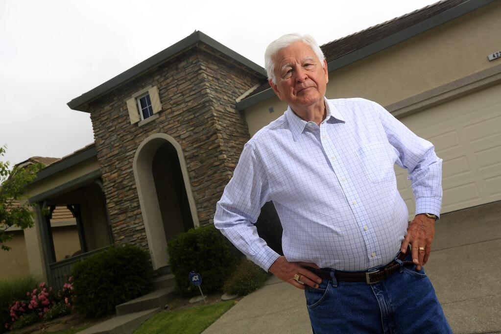John Martin outside his Windsor home, wants his property and that of other Windsor residents removed from the North Sonoma County Healthcare District, a process known as detachment. (JOHN BURGESS / THE PRESS DEMOCRAT)