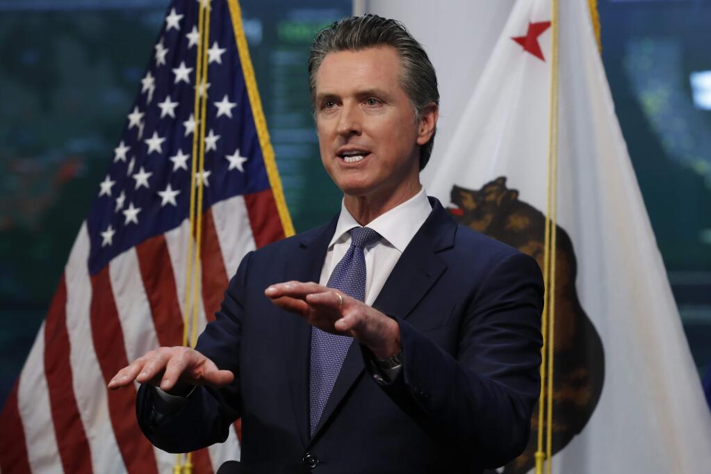 Gov. Gavin Newsom faces a grim new budget picture because of the coronavrius outbreak. (RICH PEDRONCELLI / Associated Press)