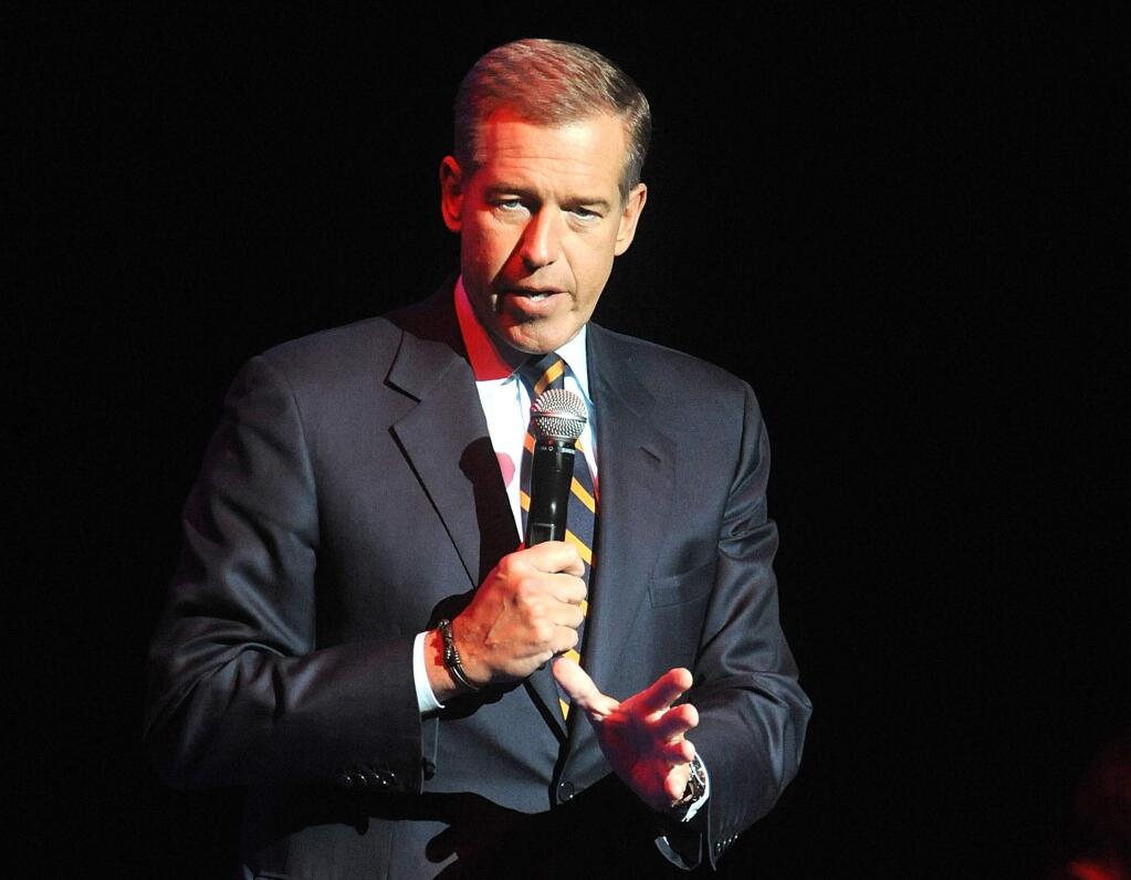 FILE - In this Nov. 5, 2014, file photo, Brian Williams speaks at the 8th Annual Stand Up For Heroes, presented by New York Comedy Festival and The Bob Woodruff Foundation in New York. Williams will return to the air on Sept 22, 2015, as part of MSNBCís coverage of Pope Francisí visit to the United States. (Photo by Brad Barket/Invision/AP, File)