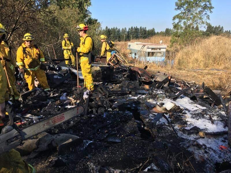 A fire at a large homeless camp on the edge of Rohnert Park burned a makeshift home on wooden pallets on Sunday, Oct. 13, 2019. (Rancho Adobe Fire Protection District)