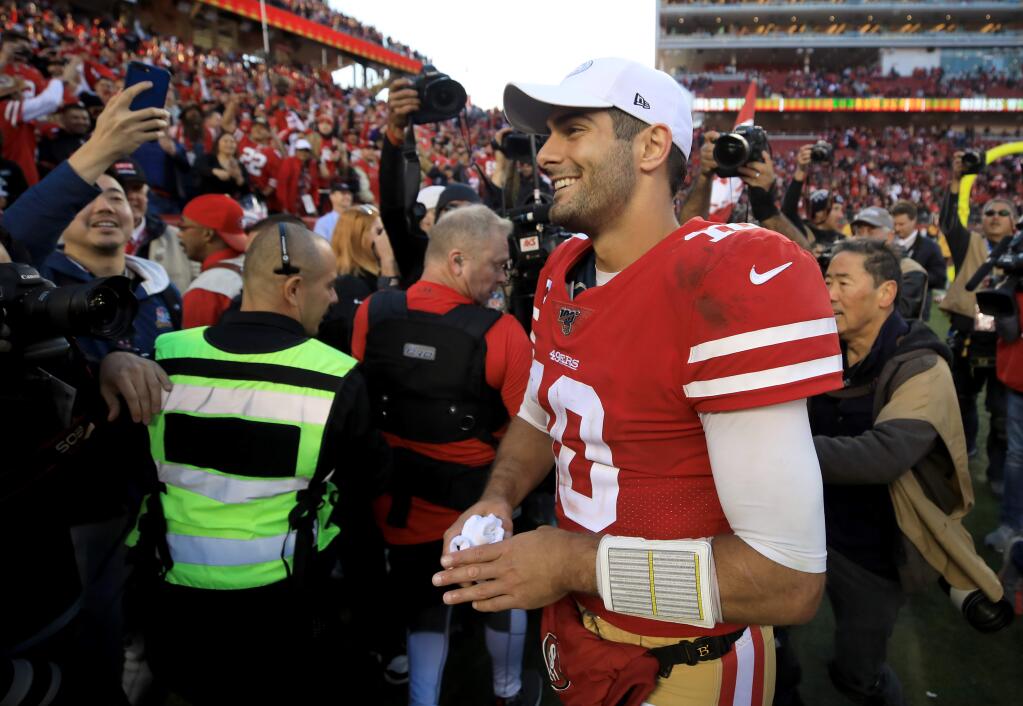 Jimmy Garoppolo is all smiles after San Francisco's 27-10 NFC divisional playoff win over Minnesota, Saturday, Jan. 11, 2019 in Santa Clara. (Kent Porter / The Press Democrat)