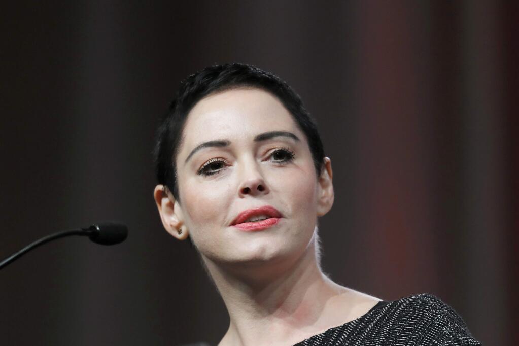 FILE- In this Oct. 27, 2017, file photo, actress Rose McGowan speaks at the inaugural Women's Convention in Detroit. McGowan spoke to TV critics Tuesday about her upcoming documentary series 'Citizen Rose' and what she called her global struggle against sexual assault and economic injustice. She has been privately taping her life for several years, joining with Bunim-Murrary Productions to create the documentary series. (AP Photo/Paul Sancya, File)