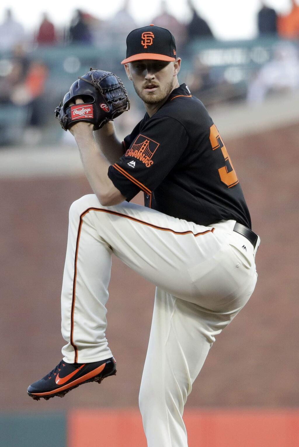 San Francisco Giants starting pitcher Chris Stratton throws to the Washington Nationals during the first inning of a baseball game Monday, April 23, 2018, in San Francisco. (AP Photo/Marcio Jose Sanchez)