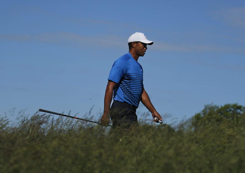 Tiger Woods walks up to the sixth tee during a practice round for the U.S. Open Golf Championship, Tuesday, June 12, 2018, in Southampton, N.Y. (AP Photo/Julie Jacobson)