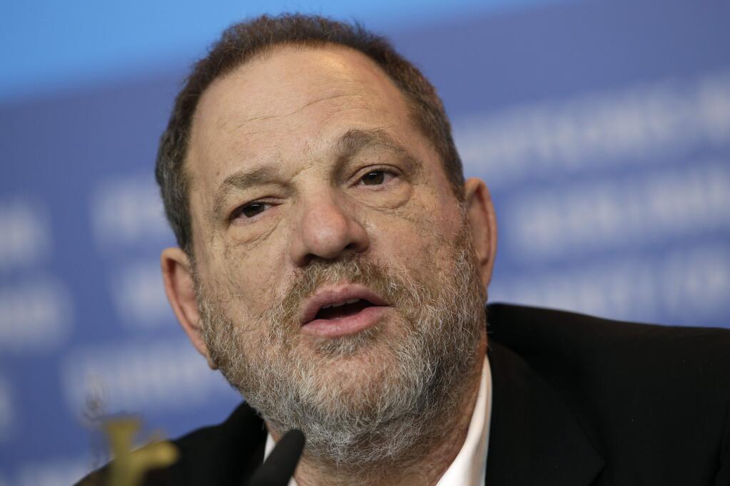 FILE - In this Feb. 9, 2015 file photo, Harvey Weinstein speaks during a press conference for the film 'Woman in Gold' at the 2015 Berlinale Film Festival in Berlin. Leadership of the Television Academy, which bestows the Emmy Awards, voted Monday, Nov. 6, 2017, to expel Weinstein from its ranks for life. The decision is the latest honor that Weinstein has lost in the wake of allegations he sexually harassed dozens of women. (AP Photo/Michael Sohn, File)