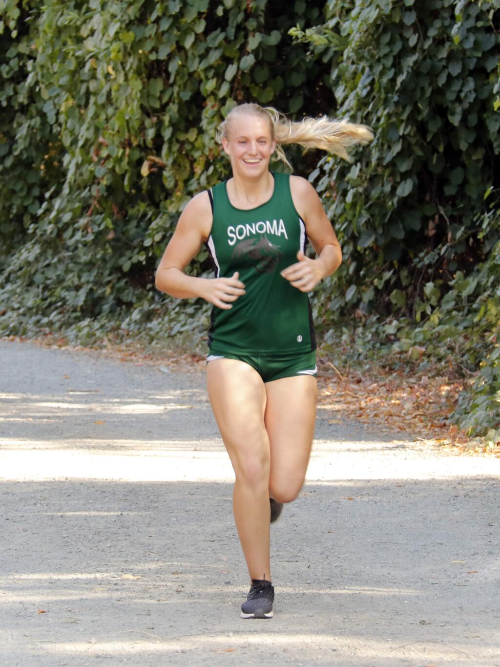 Sonoma Valley's Charlotte Hunter enjoys the Home Interlock cross country meet at Maxwell Farms on Wednesday, Sept. 11. The senior finished in fourth place. (Christian Kallen/Index-Tribune)