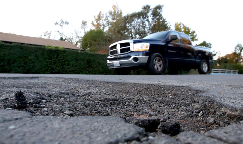 Measure A, a quarter-cent sales tax increase on Tuesday's ballot, would raise about $20 million a year. County supervisors say they'll spend their share on road repairs and transit. (CRISTA JEREMIASON / The Press Democrat)