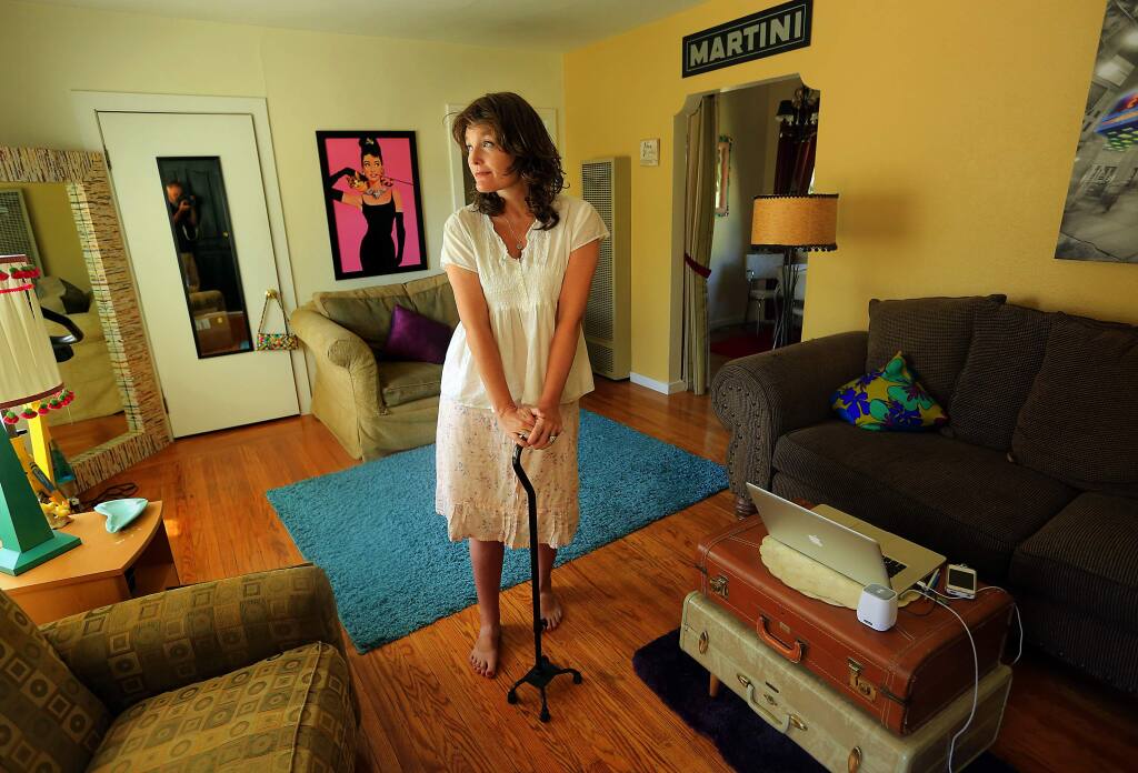 (FILE PHOTO) Christine Webster is being forced out of her Healdsburg home after 10 years because the landlord is raising her rent by 65 percent. Webster, who suffered a stroke 8 years ago and lives on a fixed income, can't afford the increase. (JOHN BURGESS / The Press Democrat) 2015