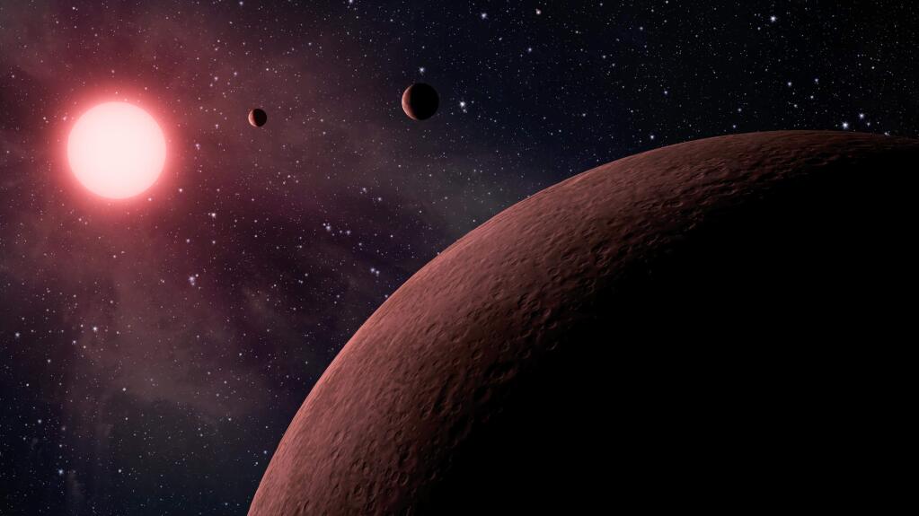 This artist rendering provided by NASA/JPL-Caltech shows some of the 219 new planet candidates, 10 of which are near-Earth size and in the habitable zone of their star identified by NASA's Kepler space telescope. NASA says its planet-hunting telescope has found 10 new planets outside our solar system that are likely the right size and temperature to potentially have life on them. As the Kepler telescope finished its main mission, NASA announced Monday that it has seen a total of 49 planets in the “Goldilocks Zone” for possible life. And they only looked in a tiny part of the galaxy. (NASA/JPL-Caltech via AP)