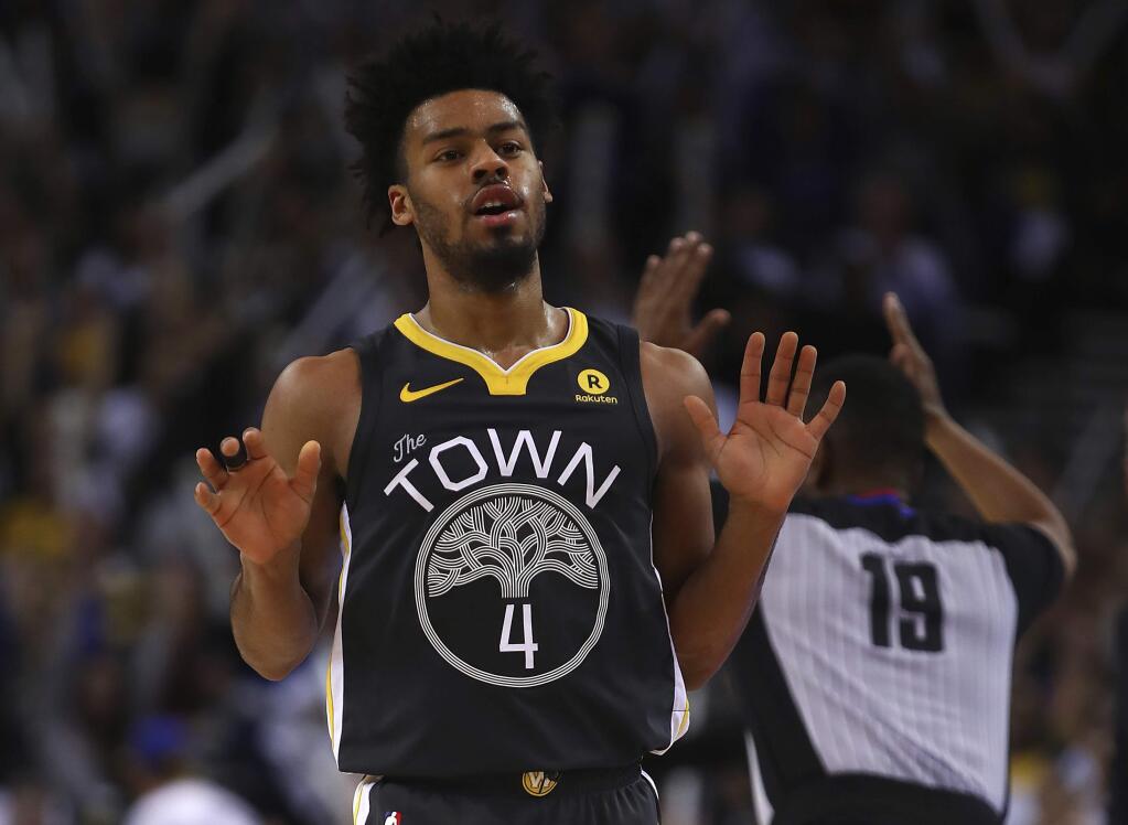 The Golden State Warriors' Quinn Cook celebrates a score against the New Orleans Pelicans during the second half Saturday, April 7, 2018, in Oakland. (AP Photo/Ben Margot)