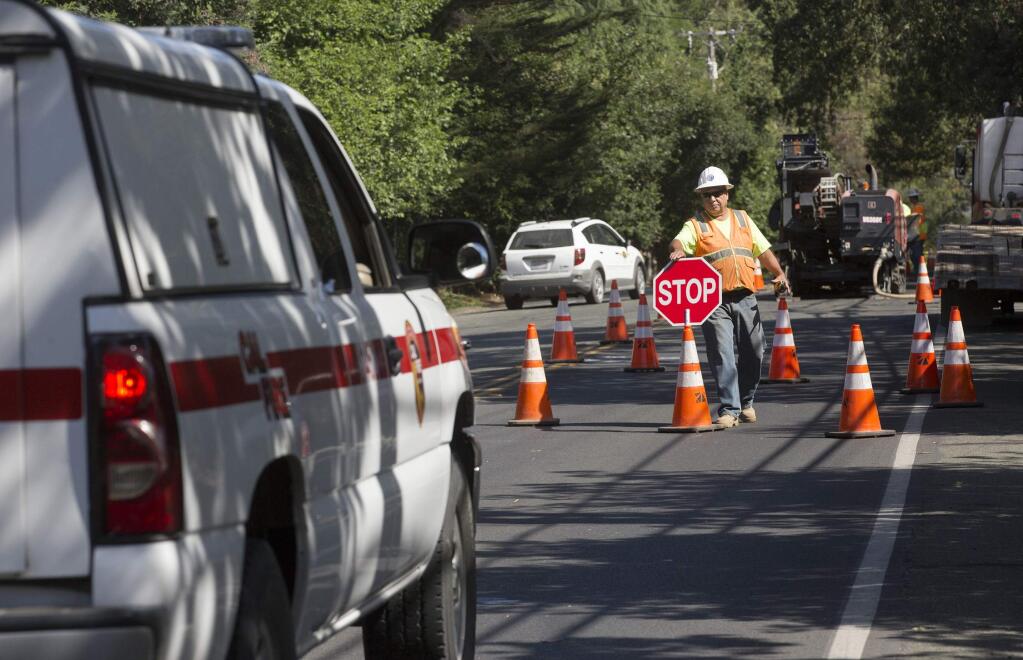 A half-mile stretch of Arnold Drive is reduced to one-lane traffic from Monday through Friday, 8 a.m. to 4 p.m., as crews replace gas lines in a PG&E project scheduled to last through August. (Photo by Robbi Pengelly/Index-Tribune)