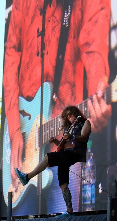 The Deadlies bass player Bob St. Laurent kicks it up at BottleRock in Napa, Friday May 27, 2016. (Kent Porter / Press Democrat) 2016