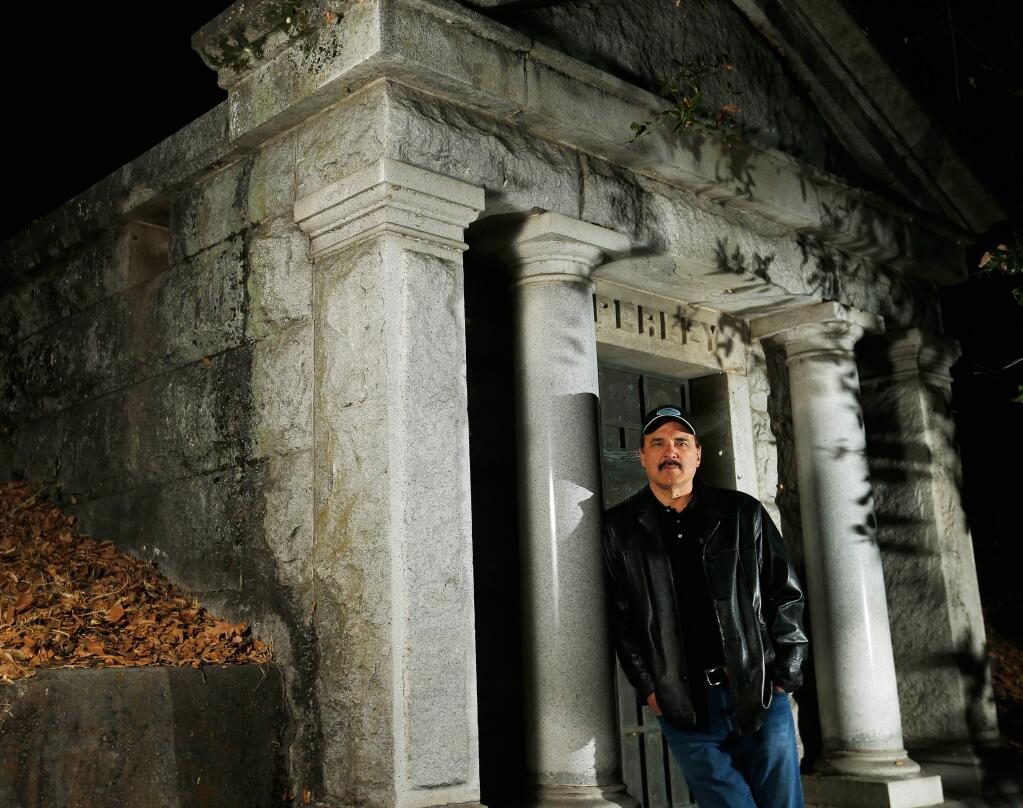 Filmmaker Tom Wyrsch at Santa Rosa Rural Cemetery, in Santa Rosa, California on Wednesday, September 14, 2016. Wyrsch's upcoming documentary film, 'Haunted Sonoma County,' will debut at the Sebastiani Theatre in October. (Alvin Jornada / The Press Democrat)