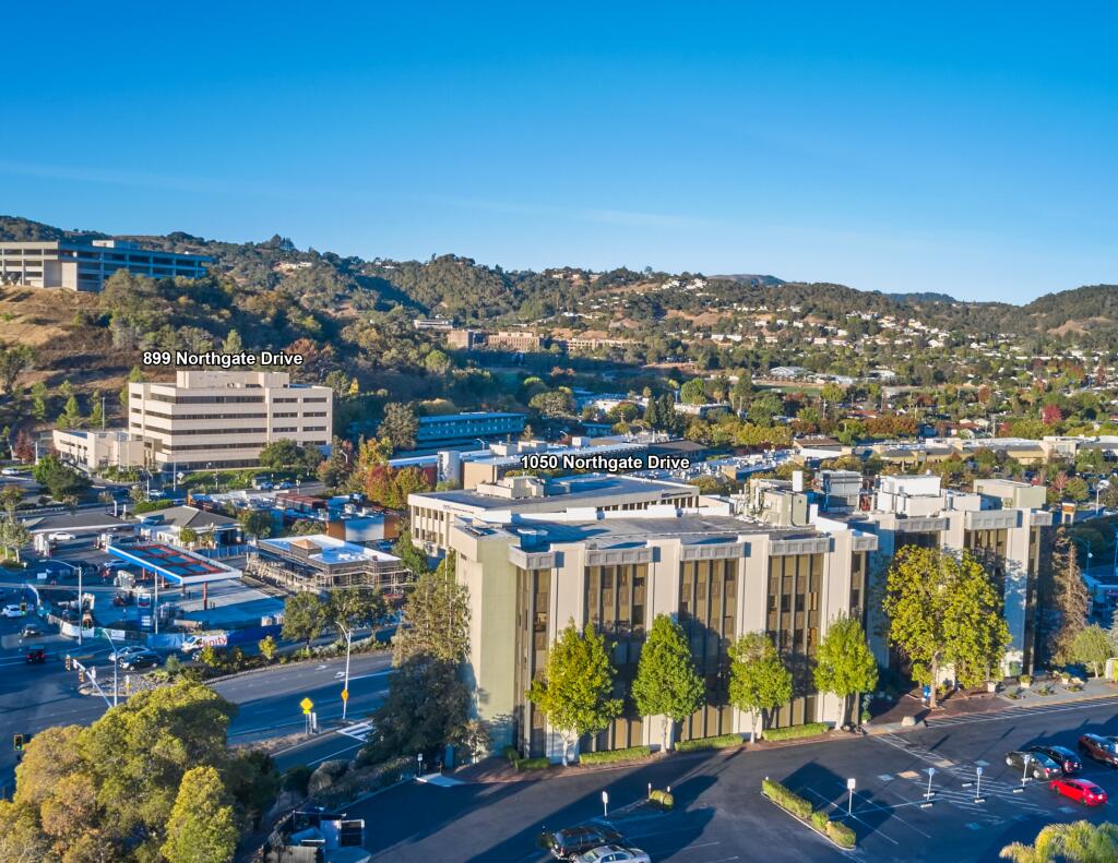 The 899 and 1050 Northgate Drive office buildings in north San Rafael were part of the 60-property Professional Financial Investors portfolio sale in December 2021 for $436 million. (courtesy of Newmark)