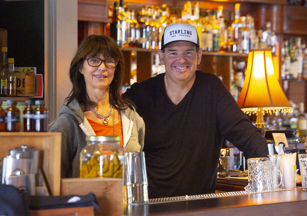 Elizabeth Takeuchi-Krist and Fred Johnson, co-owners of the Starling Bar on Highway 12, will soon be accepting Bitcoin for payment. (Photo by Robbi Pengelly/Index-Tribune)