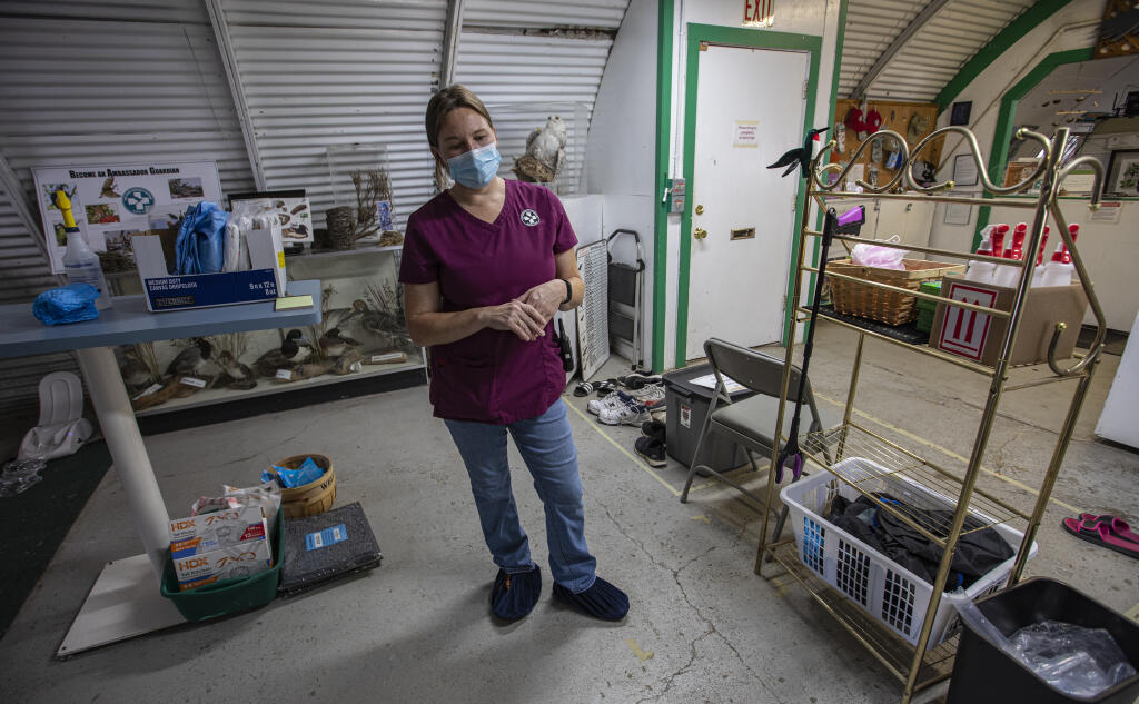 The lobby of the Bird Rescue Center has become a clean changing area as Executive Director Ashton Kluttz has kept the center ahead of the Avian Flu outbreak and have changed intake and working procedures to combat the spread, Tuesday, Aug. 2, 2022 in Santa Rosa. (Chad Surmick / The Press Democrat)
