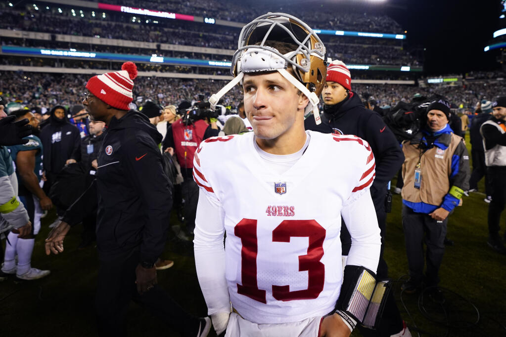 San Francisco 49ers quarterback Brock Purdy walks on the field after the NFC Championship NFL football game between the Philadelphia Eagles and the San Francisco 49ers on Sunday, Jan. 29, 2023, in Philadelphia. The Eagles won 31-7. (AP Photo/Chris Szagola)