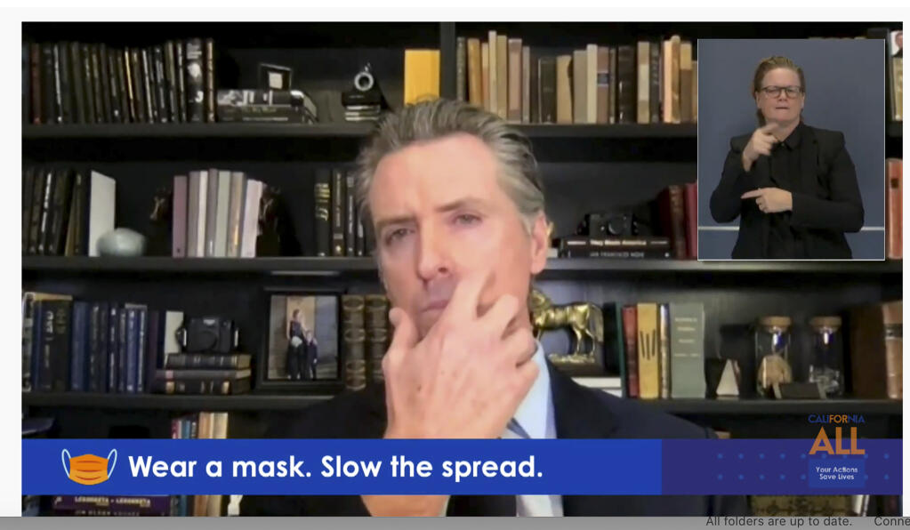 This photo from video provided by the Office of the Governor shows California Gov. Gavin Newsom during a virtual briefing from his home in Sacramento, Calif., Monday, Nov. 30, 2020.  (Office of the Governor via AP)
