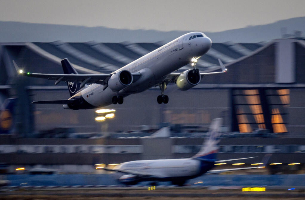 A Lufthansa aircraft takes off from the airport in Frankfurt, Germany, Thursday, Sept. 1, 2022. Lufthansa pilots will go on strike on Friday. (AP Photo/Michael Probst)