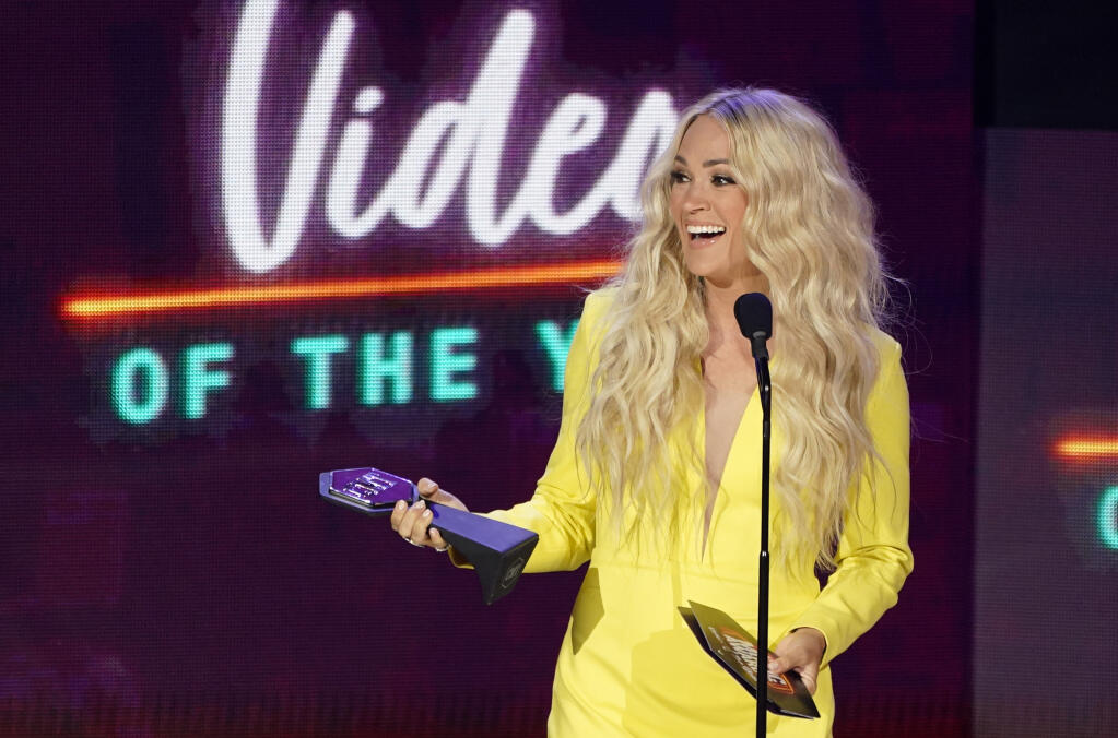 Carrie Underwood accepts the award for video of the year for "Hallelujah" at the CMT Music Awards at the Bridgestone Arena on Wednesday, June 9, 2021, in Nashville, Tenn. (AP Photo/Mark Humphrey)