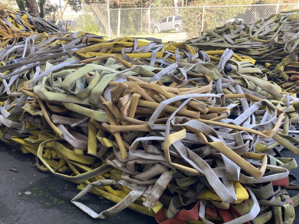 Discarded hoses — 4,700 pounds of hose from the 2020 Glass Fire and another 2,500 from the 2019 Kincade Fire — were pulled from the waste stream and some used to make products like drink coasters. (courtesy of Steffen Kuehr / TekTailor)