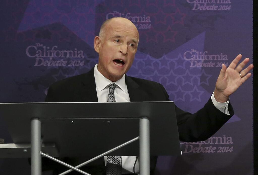 In this Sept. 4, 2014, file photo, Gov. Jerry Brown speaks during a gubernatorial debate with Republican challenger Neel Kashkari in Sacramento, Calif. (AP Photo/Rich Pedroncelli, Pool, File)