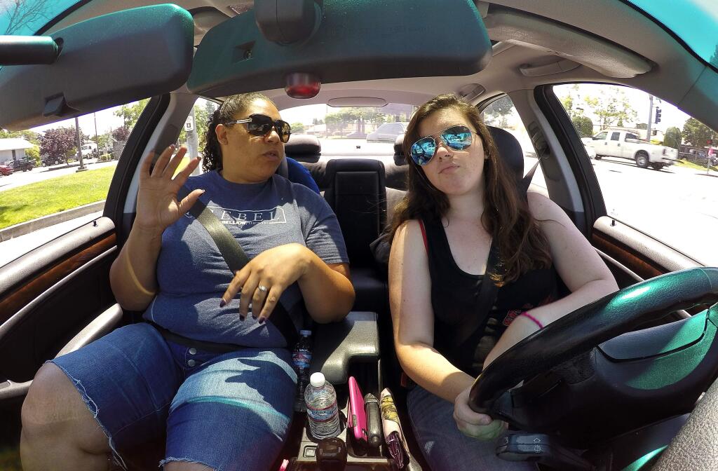 John's Driving School instructor Della Radtke, left, instructs Lisa Myers-Littler, 17, during her driver's training lesson, in Santa Rosa on Tuesday, June 20, 2017. (Christopher Chung/ The Press Democrat)