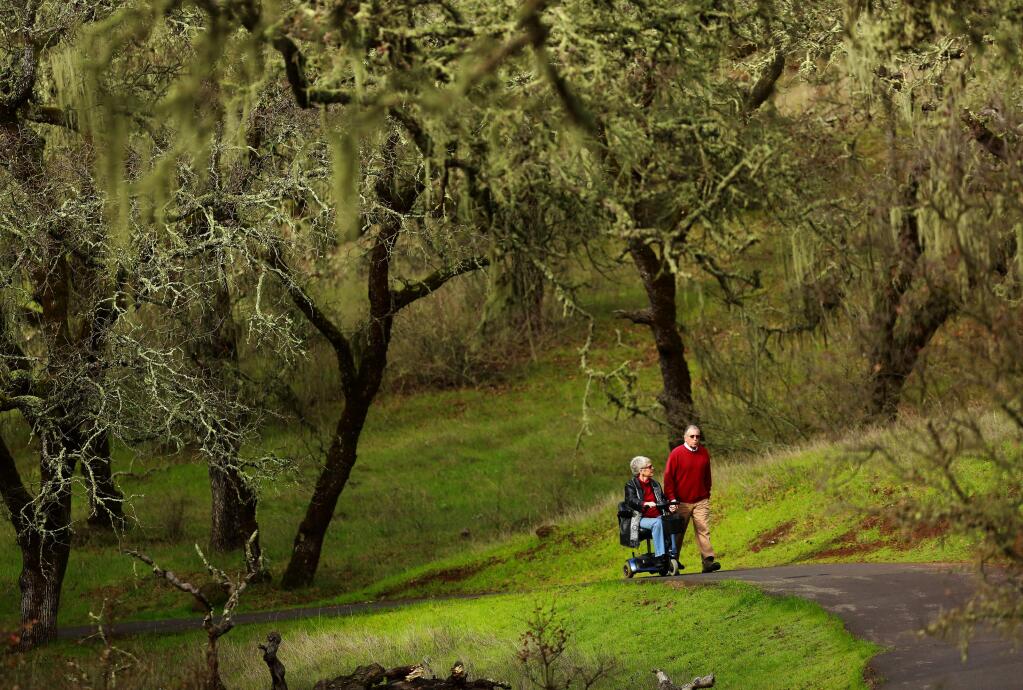JOHN BURGESS / The Press DemocratJeanne Allen of Sonoma, who has multiple sclerosis, enjoys the accessible trail in Sonoma Valley Regional Park with her husband, Chip. Soon she will have more options.