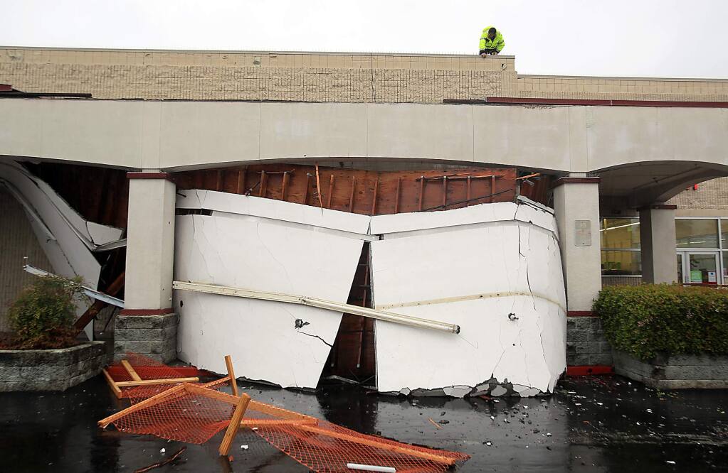 Heavy rain caused a section of awning collapse in front of the Kmart in Santa Rosa,Thursday March 10, 2016. (Kent Porter / Press Democrat ) 2016