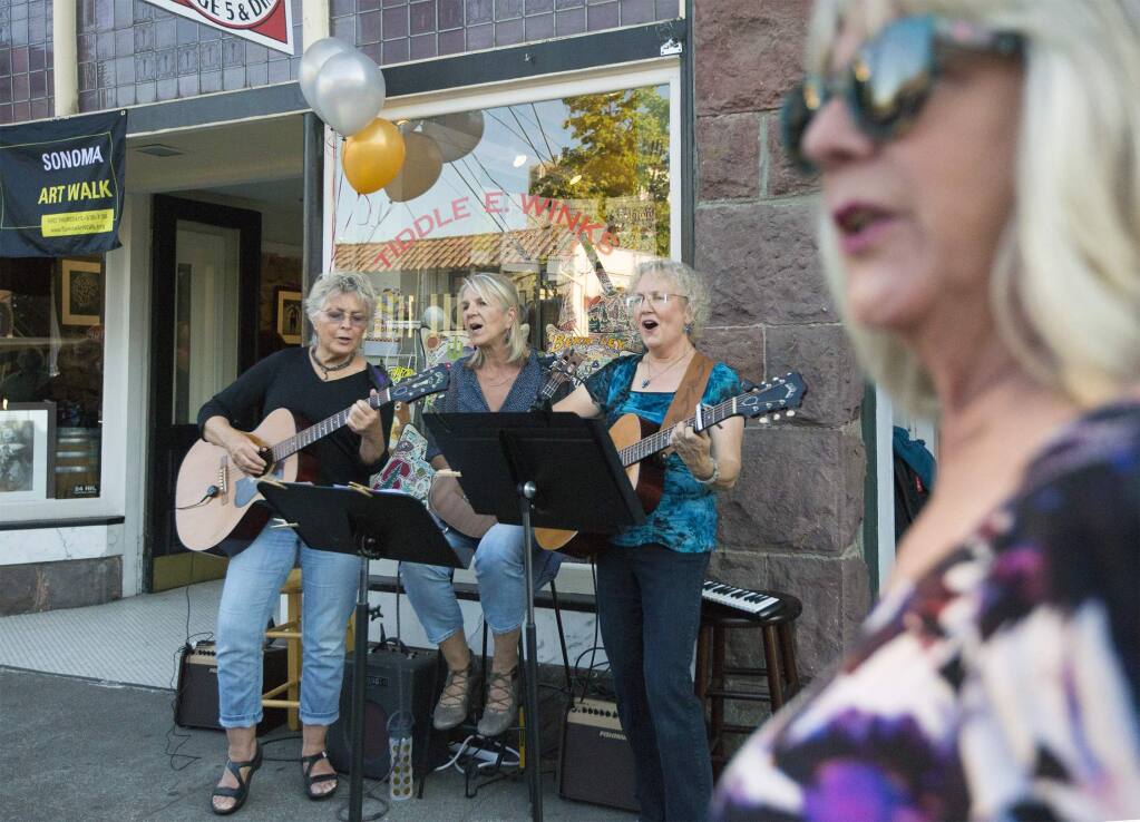 Music from the DollyMammas was featured by Tiddle E. Winks on East Napa St. The first Sonoma Art Walk took place in Sept. All around the Plaza, local businesses and galleries joined in helping showcase local artisans. (Photo by Robbi Pengelly/Index-Tribune)