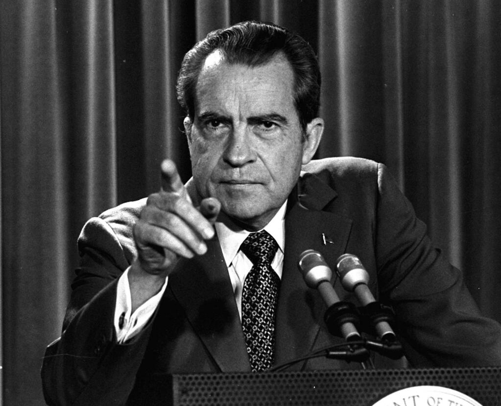 FILE - In this March 15, 1973, file photo President Nixon tells a White House news conference that he will not allow his legal counsel, John Dean, to testify on Capitol Hill in the Watergate investigation and challenged the Senate to test him in the Supreme Court. Few presidents in modern times have been as interested in gun control as Richard Nixon. He proposed ridding the market of Saturday night specials, contemplated banning handguns altogether and refused to pander to gun owners by feigning interest in their weapons. (AP Photo/Charles Tasnadi, File)