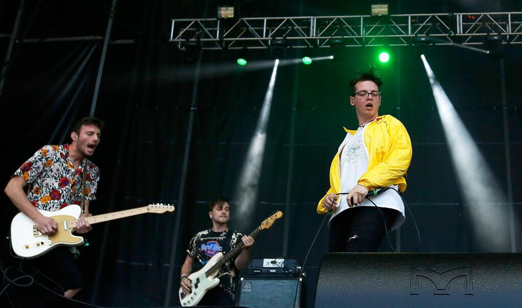 The Wrecks, frontman Nick Anderson, right, bassist Nick Kelley and guitarist Westen Weiss, left, perform on the Midway Stage during the third day of BottleRock Napa Valley, in Napa, California, on Sunday, May 27, 2018. (Alvin Jornada / The Press Democrat)