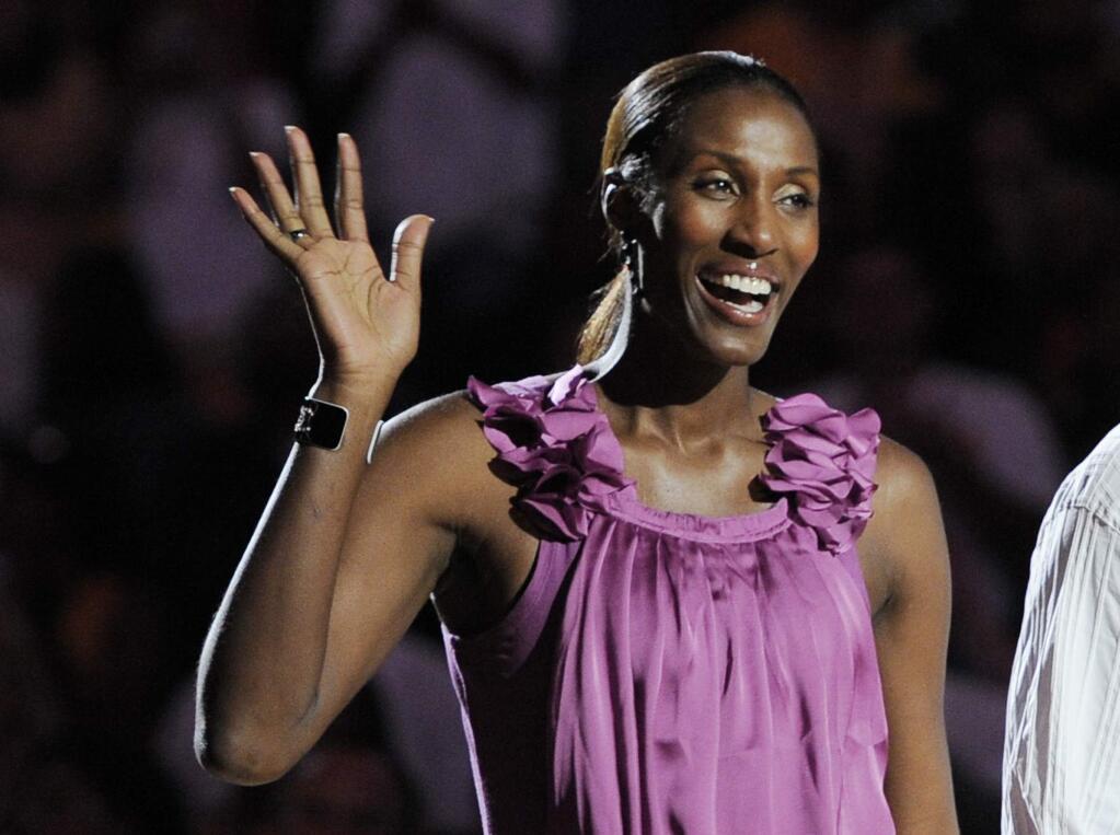 This Aug. 10, 2010, file photo shows retired Los Angeles Sparks basketball player Lisa Leslie waving to the crowd during a ceremony to retire her jersey at halftime of a WNBA basketball game between the Indiana Fever and the Sparks in Los Angeles. CBS Sports Network will air an all-women sports show starting next month. CBS said Tuesday, Aug. 26, 2014, the weekly hour-long, prime-time program on the cable channel will be the first of its kind. 'We Need to Talk' premieres Sept. 30. The panel will feature a core of CBS Sports announcers: Lesley Visser, Amy Trask, Tracy Wolfson, Dana Jacobson and Allie LaForce.(AP Photo/Chris Pizzello, File)