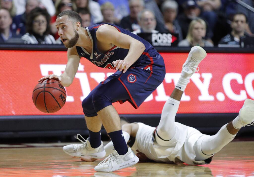 In this March 12, 2019, file photo, St. Mary's Jordan Ford dribbles around a Gonzaga player during the second half in the championship of the West Coast Conference tournament in Las Vegas. (AP Photo/John Locher, File)