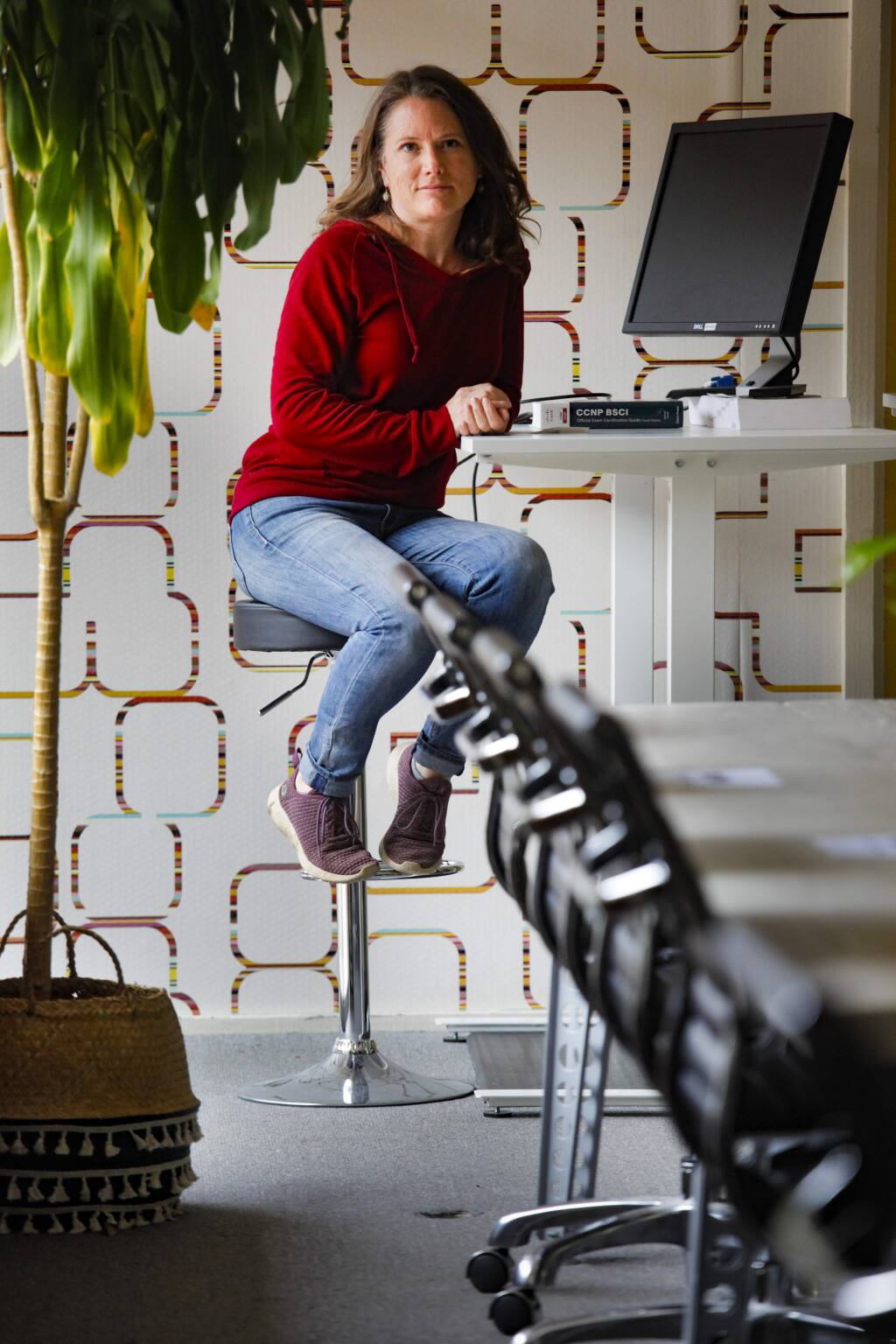 Natasha Juliana, owner of WORK Petaluma, a shared workspace in downtown Petaluma, sits in her empty office space that is usually bustling with those who work remotely. (CRISSY PASCUAL/ARGUS-COURIER STAFF)
