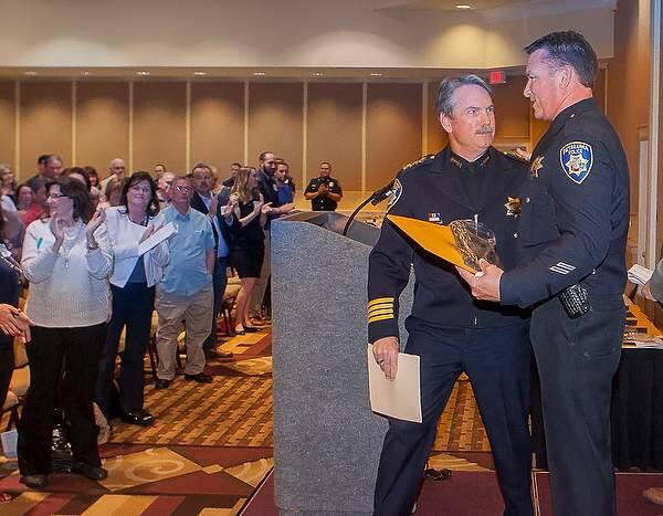 Chief Williams comments to Officer Novello, winner of Police Officer of the Year at the 2016 Community Awards of Excellence at the Sheraton Sonoma Hotel April14, 2016. Novello, who retired in October 2020, faces two misdemeanor assault charges for an incident that occurred July 20, 2020. (JOHN O'HARA/FOR THE ARGUS-COURIER)