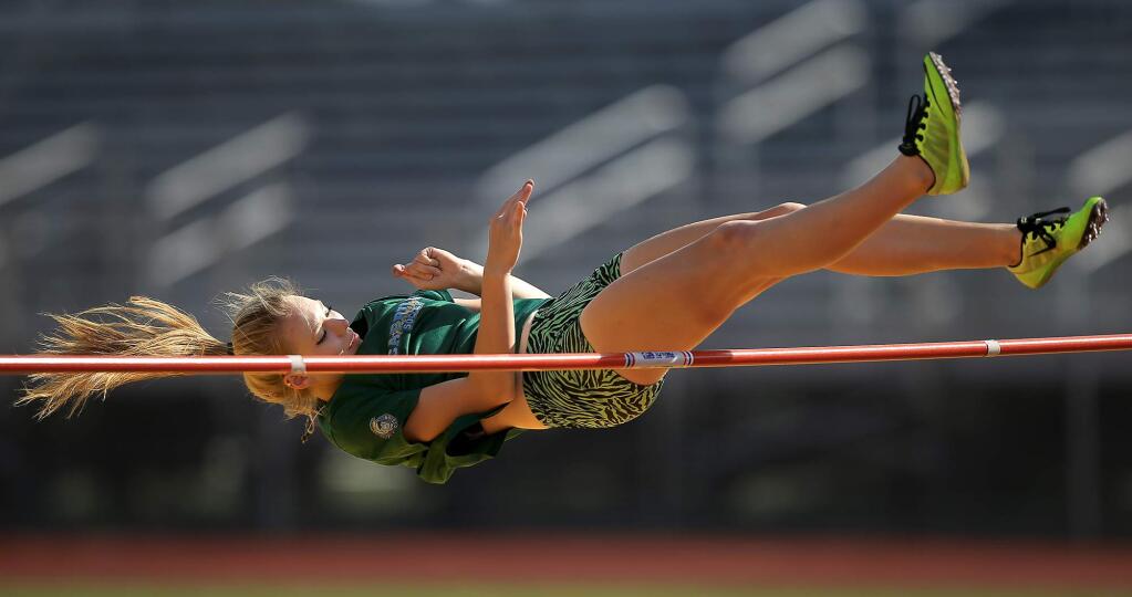 Kelsi Avana-Reihl practices the high jump during track practice at Maria Carrillo High School in Santa Rosa, Thursday May 19, 2016. (Kent Porter / Press Democrat)