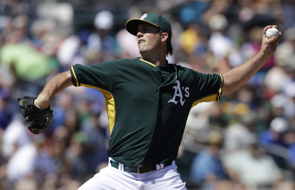 Oakland Athletics' Drew Pomeranz works against the Chicago Cubs in the first inning of a spring training exhibition baseball game Tuesday, March 24, 2015, in Mesa, Ariz. (AP Photo/Ben Margot)