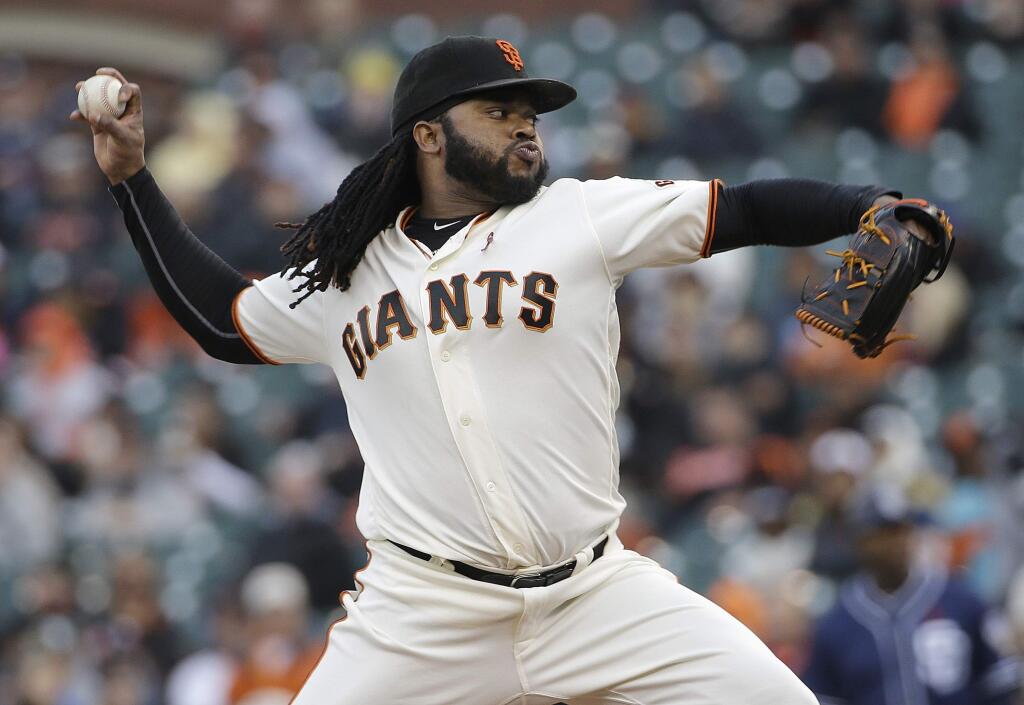 San Francisco Giants pitcher Johnny Cueto throws against the San Diego Padres during the first inning of a baseball game in San Francisco, Monday, May 23, 2016. (AP Photo/Jeff Chiu)