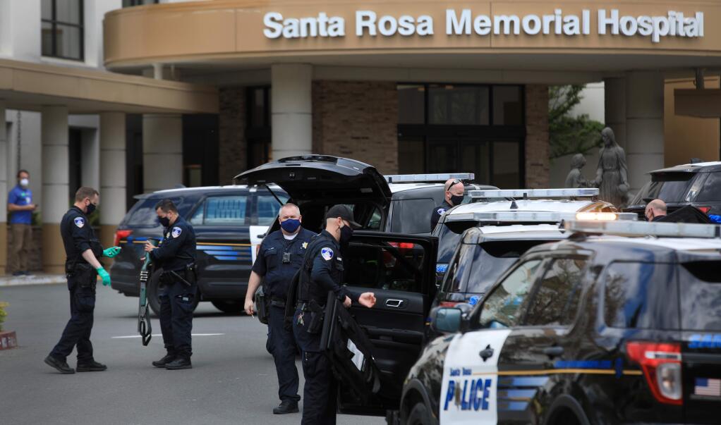 Santa Rosa police officers were called to Santa Rosa Memorial Hospital in Santa Rosa for a person with a machete in the emergency room, Friday, April 10, 2020. (Kent Porter / The Press Democrat) 2020