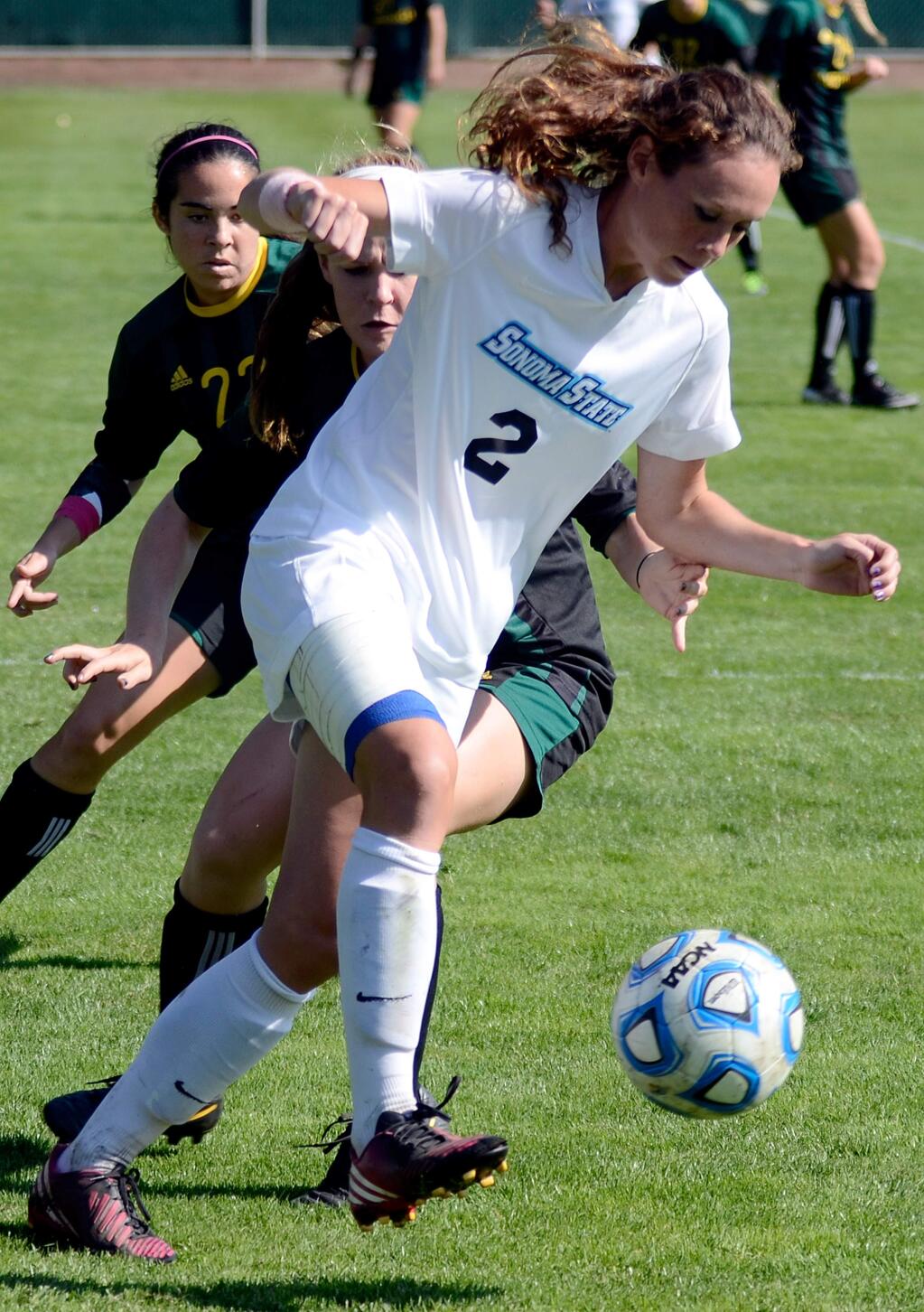 Sonoma State's Cara Curtin maintains possession of the ball during a women's soccer match between Sonoma State and Humboldt State universities, in Rohnert Park, Calif., on October 25, 2013. (Alvin Jornada / The Press Democrat)