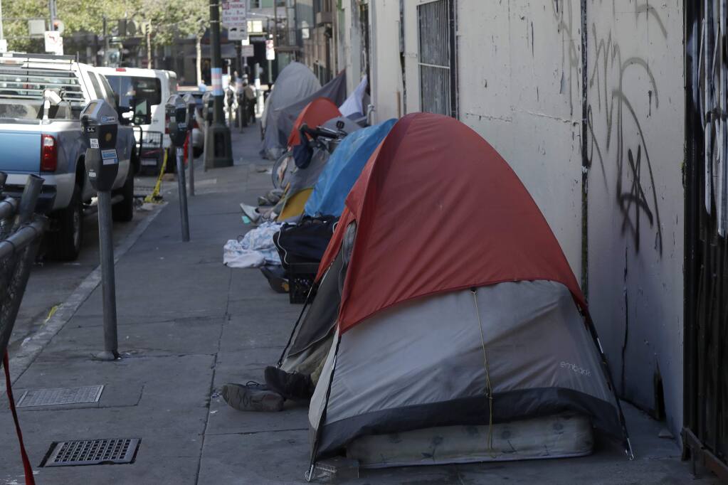 Homeless tents are shown along a street in San Francisco, Wednesday, Aug. 21, 2019. (AP Photo/Jeff Chiu)